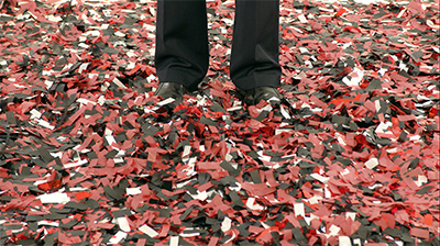 President Pastides feet with confetti all around.