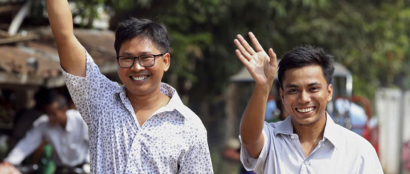 Reuters reporters Wa Lone, left, and Kyaw Soe Oo after being freed from prison, in Yangon, Myanmar, May 7, 2019. Ann Wang/Pool Photo via AP