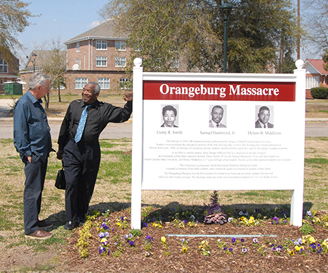 Tom Hayden and Chuck McDew at the Orangeburg Massacre memorial site in Orangeburg. 