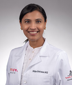 Headshot of Shilpa Srinivasan in a lab coat. 