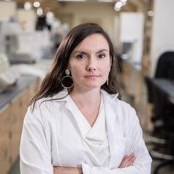 Head shot of Fiona Hollis, Ph.D. in lab
