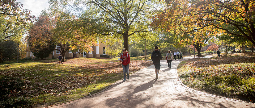 Students walk to class on the USC Horseshoe. 