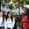 three students walking on the Horseshoe