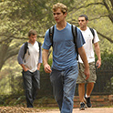 students walking on the paved paths of the horseshoe