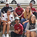 students sitting on steps