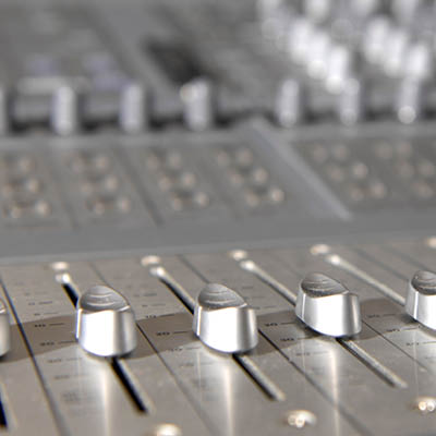 Close-up of a sound engineering board.