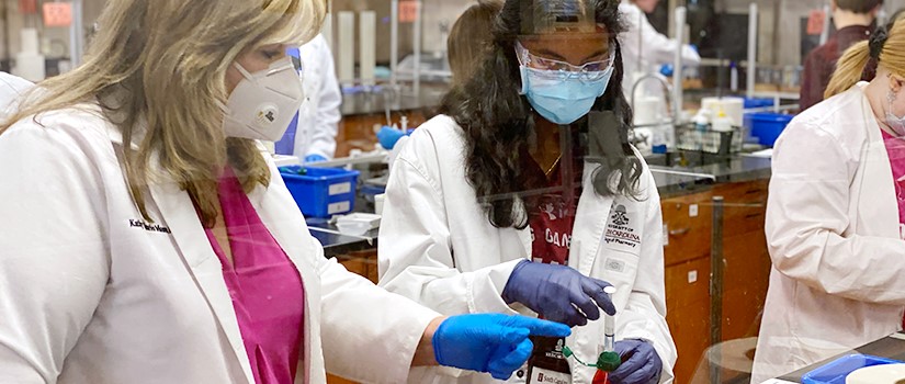 Students in a pharmacy lab for class