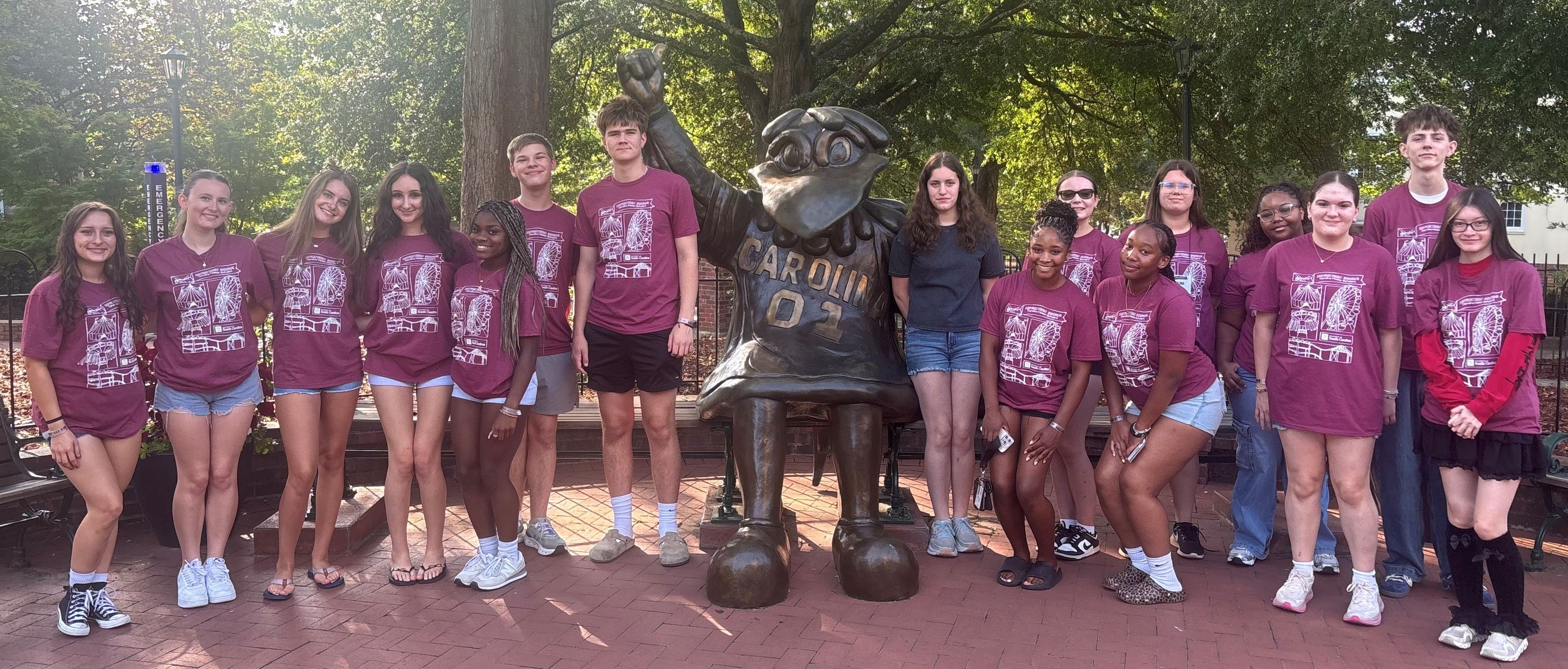 Criminology students 2026 with Cocky statue