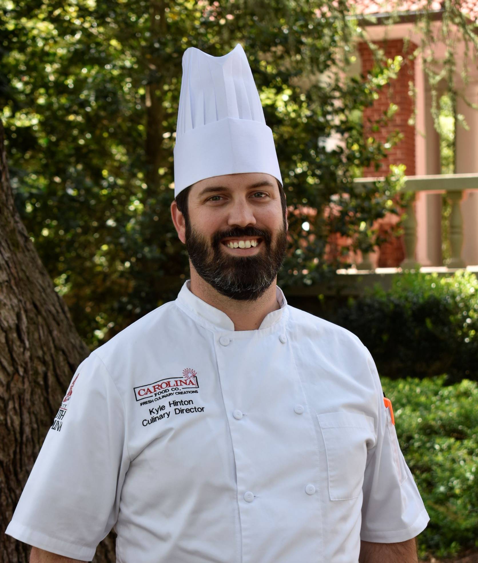 Chef Kyle Hinton standing 