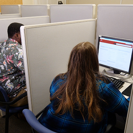 Students taking online exams in testing center