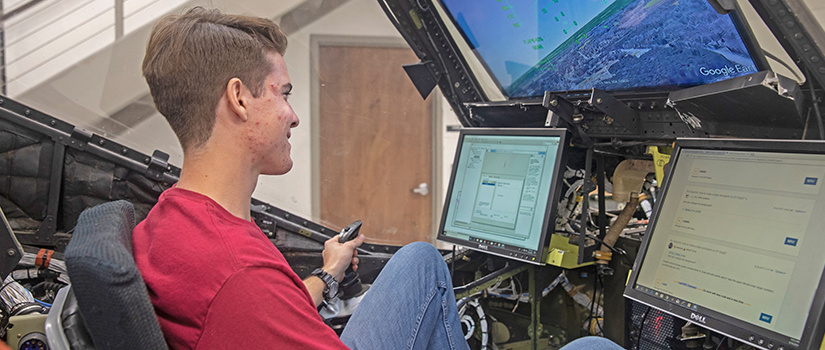 researcher using a simulator