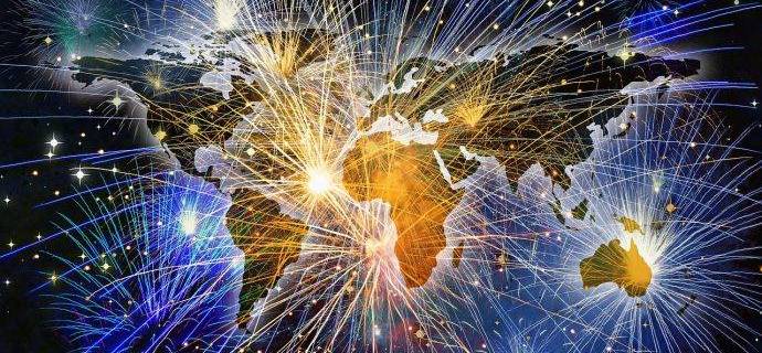 an image of the globe with fireworks coming out of each continent