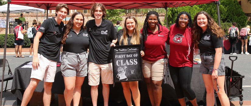Some of the Residence Hall Association executive board members tabling on the first day of class out on Greene Street on the University of South Carolina campus.