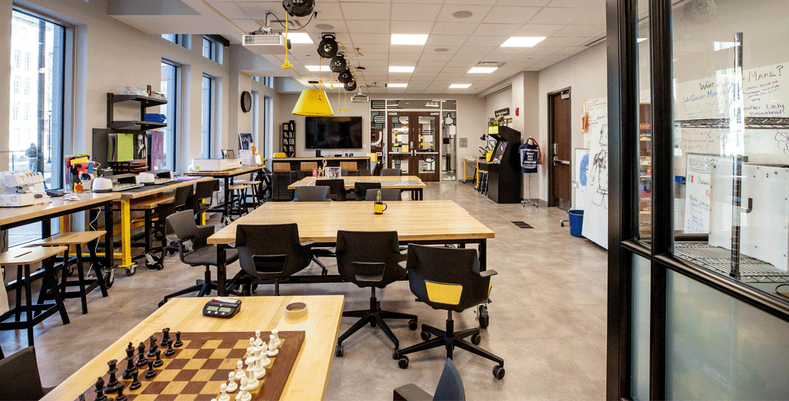 The Rhodos Makerspace in campus village featuring a chess game and equipment