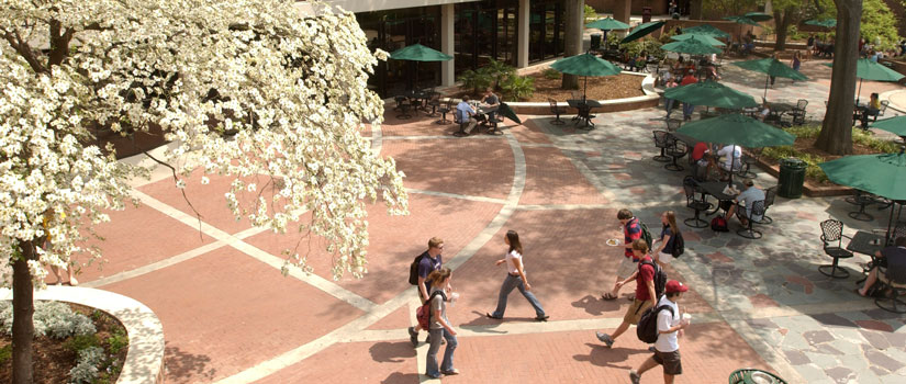 Photo of students walking on campus 