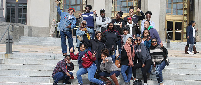 Students and staff pose during a stop on the Civil Rights alternative break