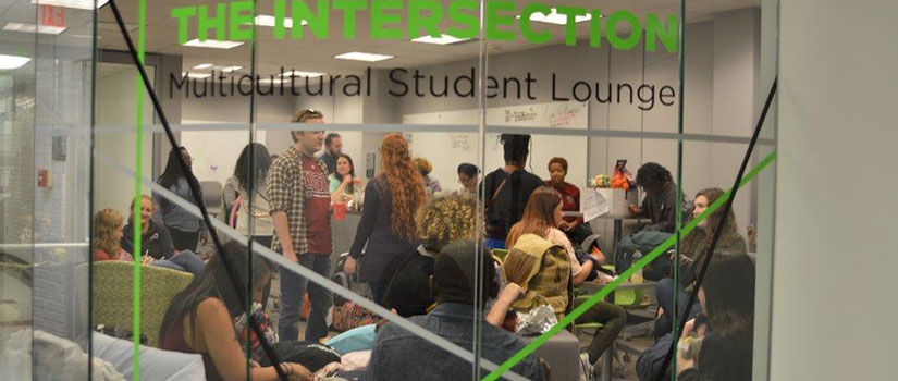 students gather to share conversations in the Intersection Multicultural Student Lounge