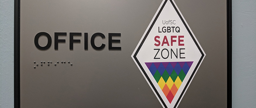 Safe Zone Ally sticker on an office nameplate. 