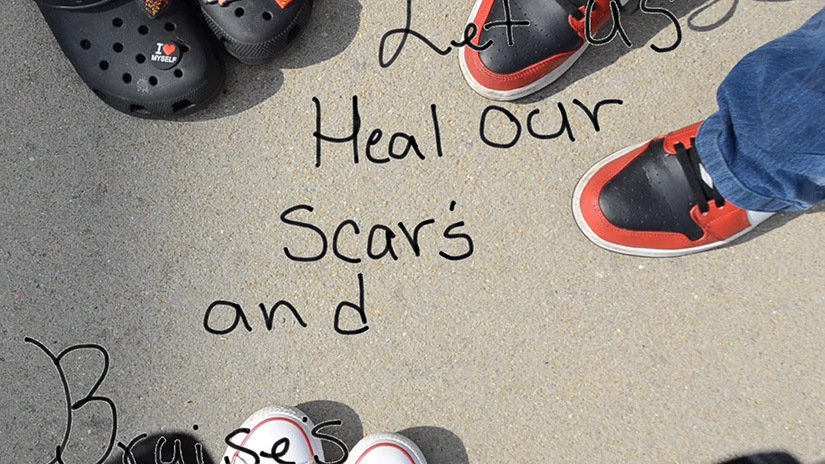 Thumbnail from a video with the title shown, Let us heal our scars and bruises.