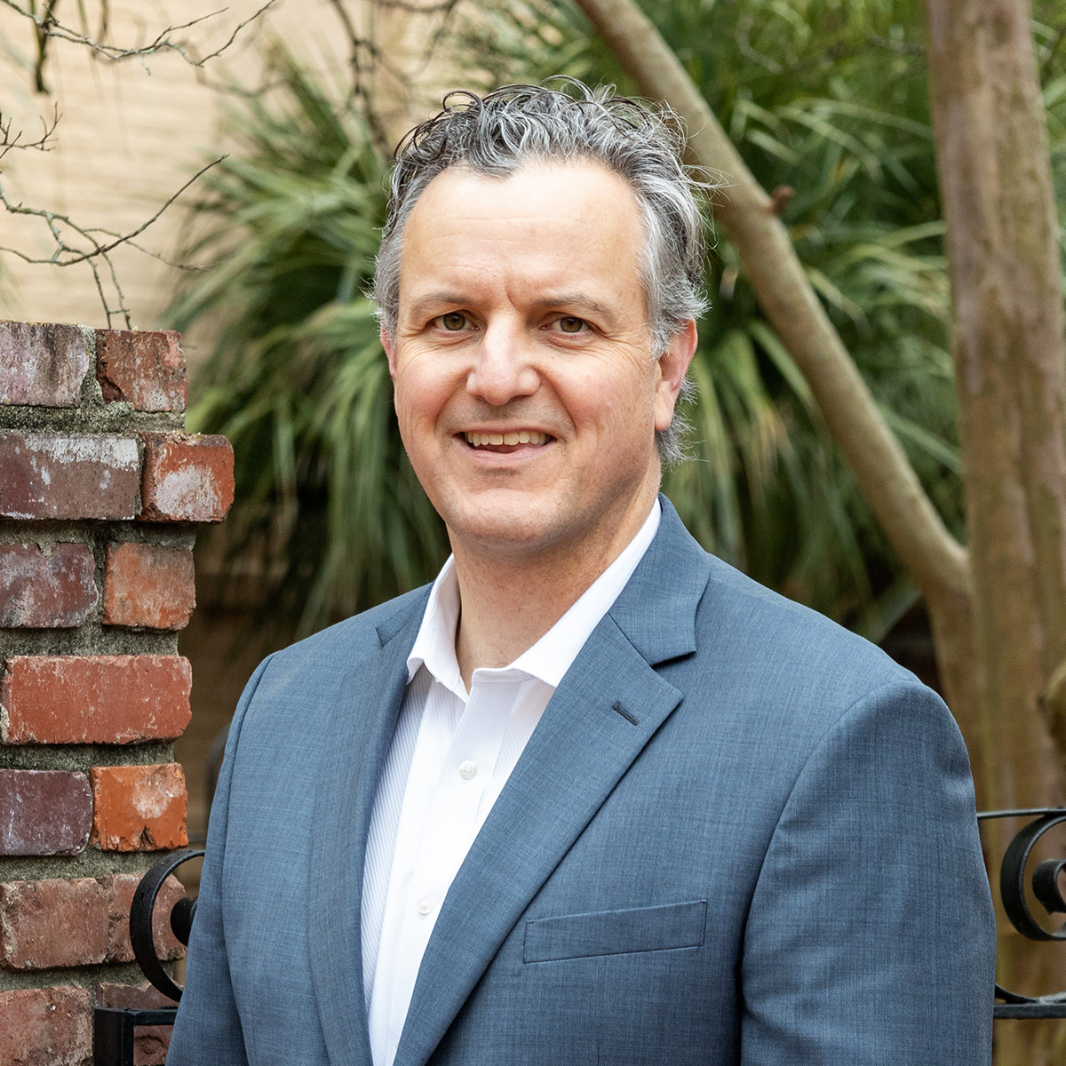 Professional headshot of Sam Todd