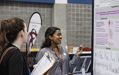Discover USC attendees view poster presentations