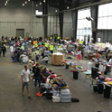 Birds eye view of warehouse holding tons of goods for the Give it up for Good sale