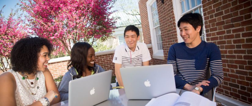 a photo of friends studying together