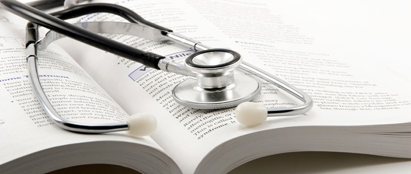 Picture of a stethoscope on a book symbolizing medicine