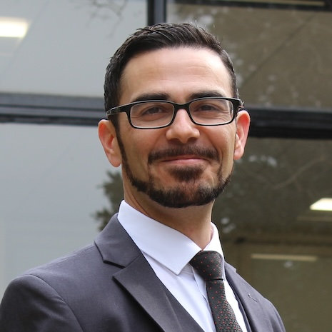 Chad Kushins headshot smiling