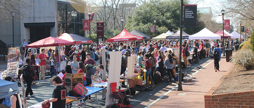 Greene Street filled with students and tents during Student Organization Fair