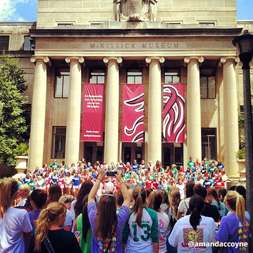 Sorority women gather in front of McKissick Museum to celebrate Bid Day.
