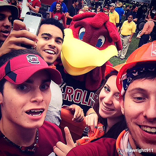 Students take selfies with Cocky at ESPN Gameday.
