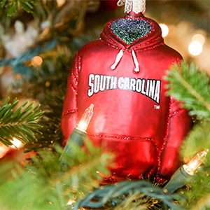 Holiday ornament of a South Carolina sweatshirt.