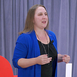 Ann Eisenburg giving their Tedx speech. 