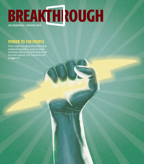 Cover of Breakthrough magazine with an illustration of a hand holding a lightning bolt. 