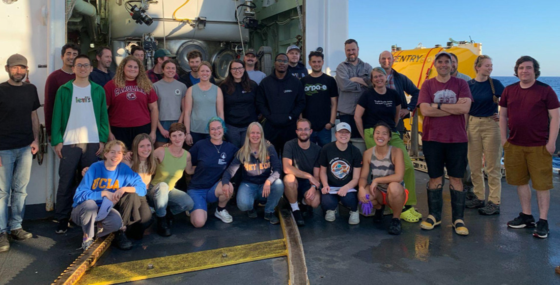 photo of a group of researchers on a ship