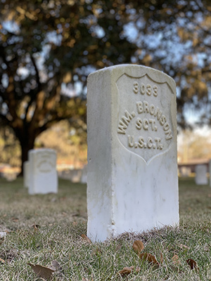 Gravesite with tombostone that reads: 3033 WM. BRONSON SGT. U.S.C.T.