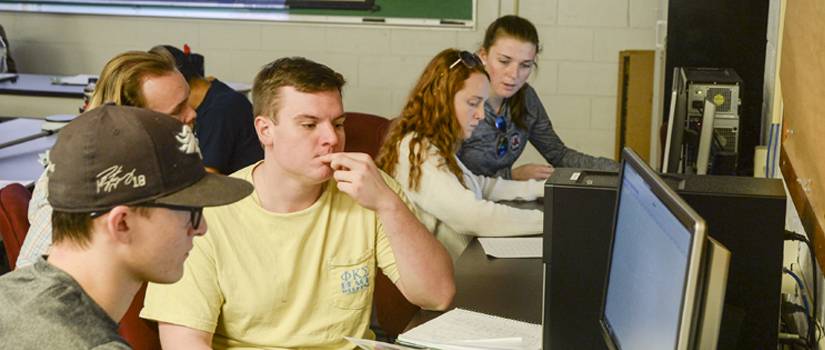 students working together in a computer lab