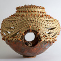 Intricate sweetgrass basket with beading