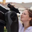 Daria Vechersckaia Looks through a telescope