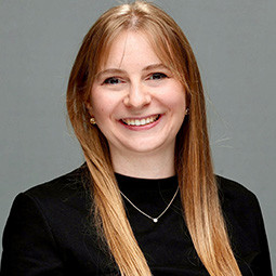 woman smiling with black top