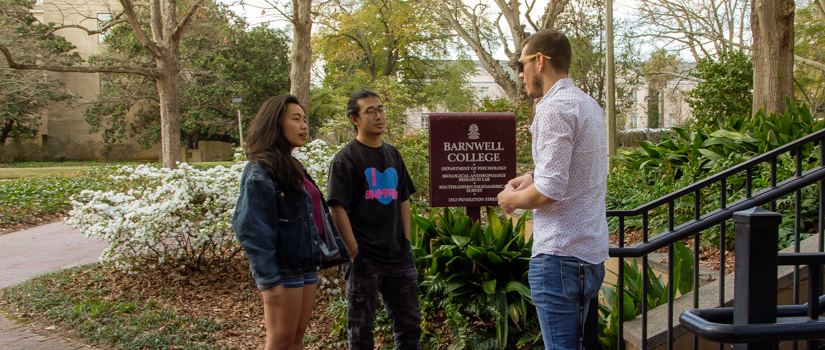 Students standing in front of Barnwell College.