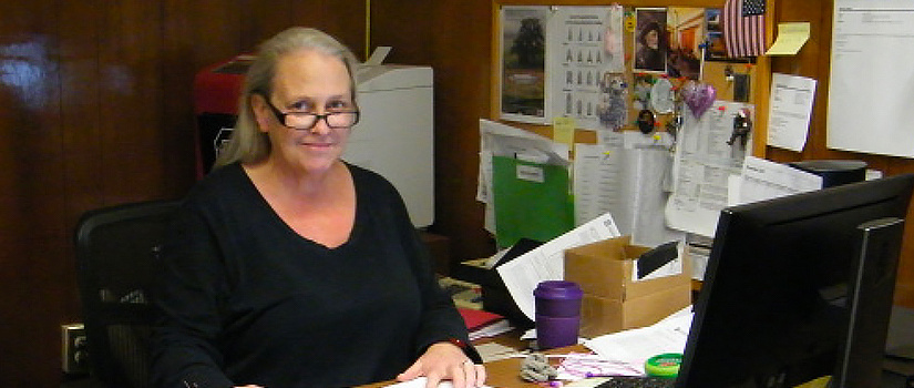 Susan Davis at her desk