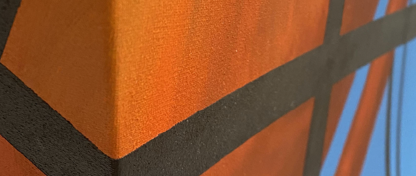 close up of orange and blue painting