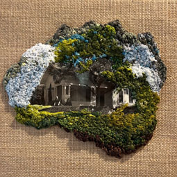 Diane Bronstein's Artwork featuring embroidery of a house against a canvas background.