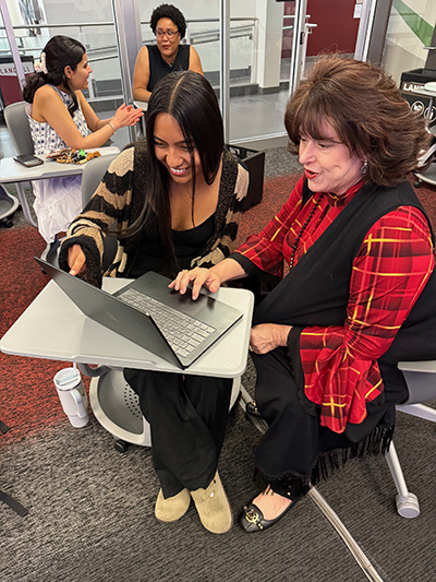 Marcia Purday with a student