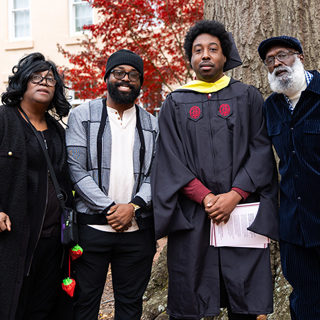 student and family outside davis college