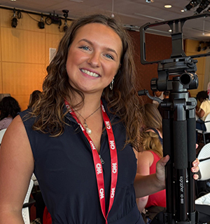 Talia Cavalline holding a camera