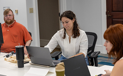 interns at computers working