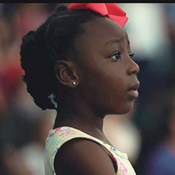 young african american girl gazing into the distance